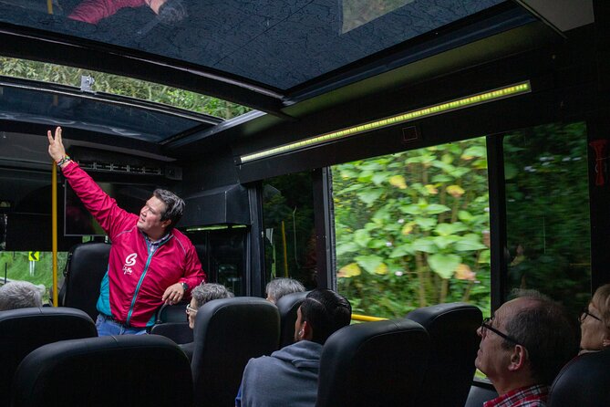 3-in-1 Panoramic city tour with walking tour and experiences - Monserrate from the city below