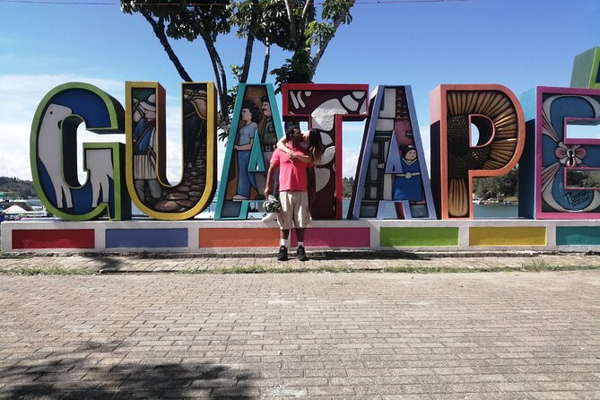 Amazing Private Guatape Tour + Boat Ride + Helicopter & Rock - Guatapé’s Malecón and the town’s painted details