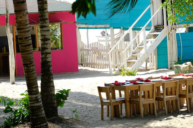 Beach Day at The Pink Mango, just 10 mins from town. - The boat transfer deserves your attention