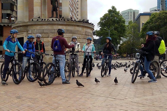 Bike Tour in Bogota Historical Sites and Fruit Market - Reading Bogotá through its street art
