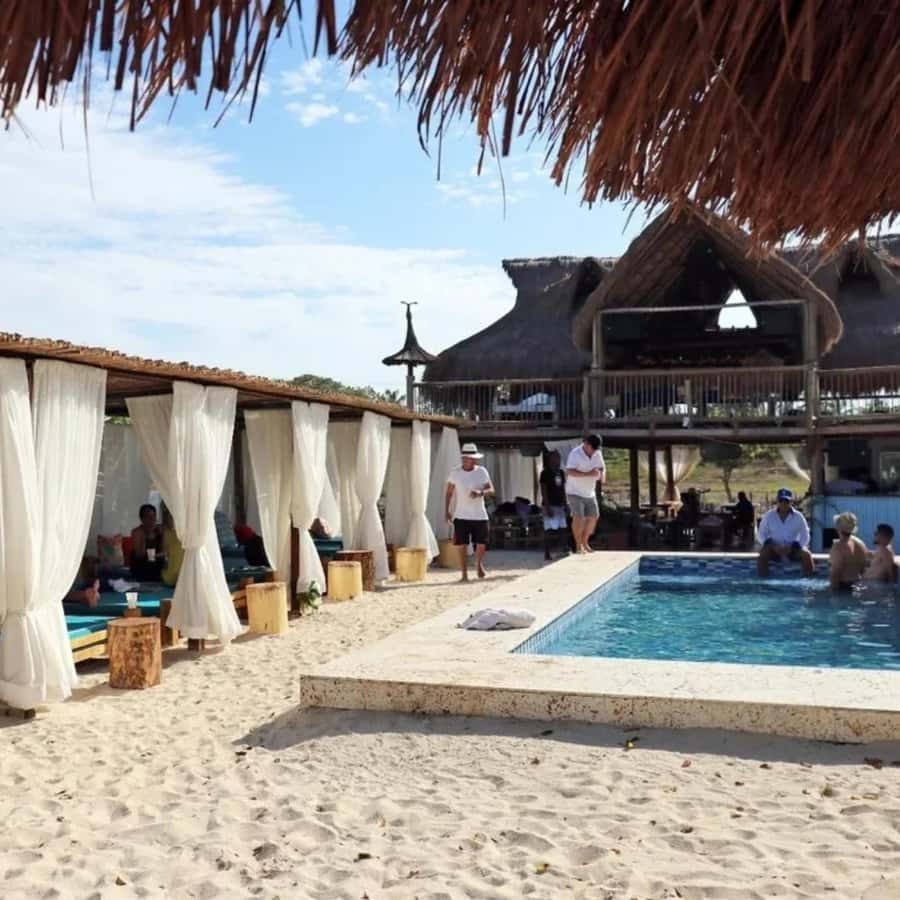 Cartagena: Beach House Tamarindo Tour - Lounge beds, beach, and pool time