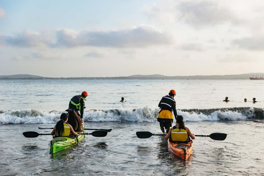 Cartagena: Sunset Sea Kayaking Tour - Paddling from the beach toward the bay