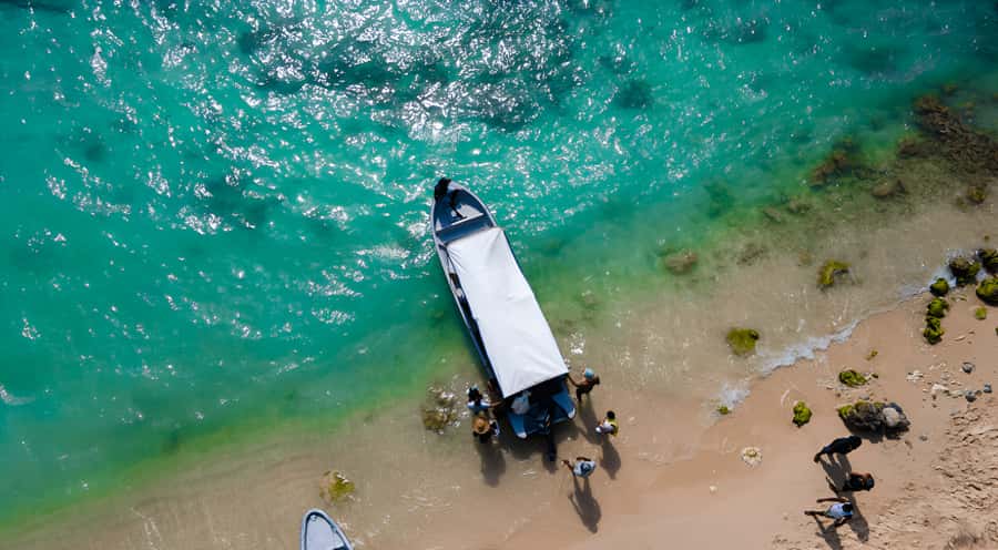 Cartagena: Tour to Playa Tranquila with Snorkeling + Luminous Plankton and Parasol - From northern Cartagena to the Baru coast