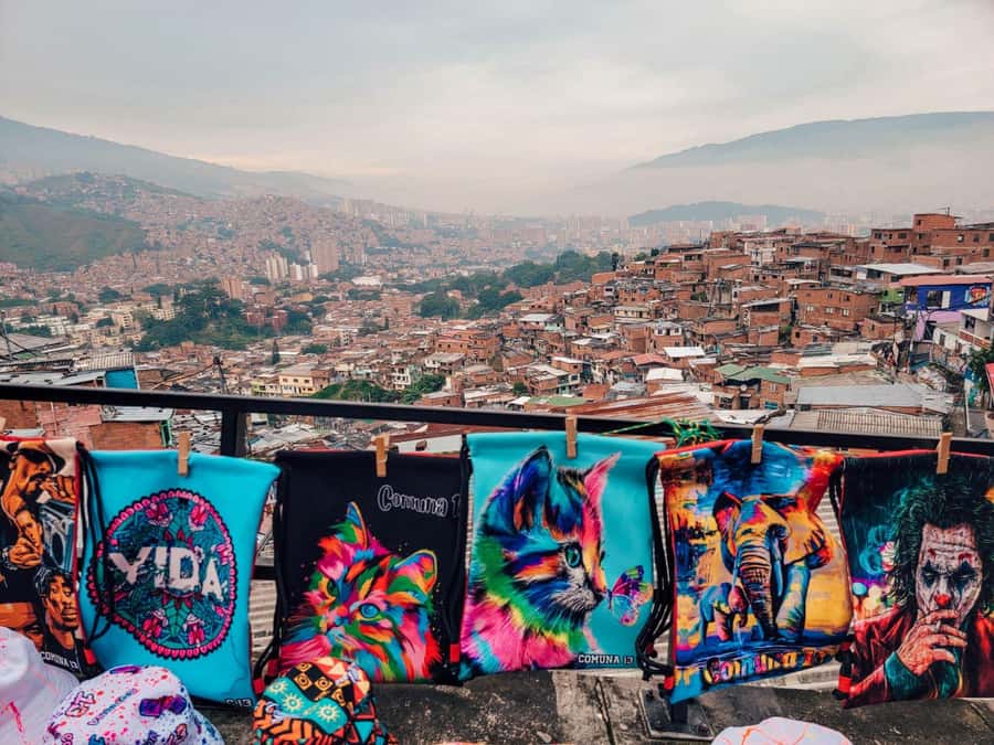 City Tour: Graffiti Tour Comuna 13 + Downtown Medellín - Riding Medellín’s cable car above the suburbs