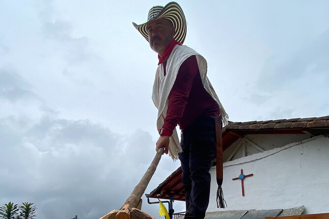 Coffee tour in Medellín with tastings and transportation - Picking coffee on a steep hillside