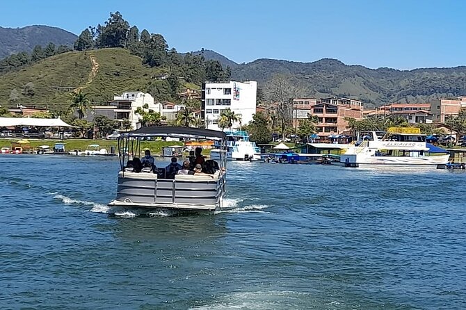 Day Trip To Guatapé with ,Breakfast, Lunch and Boat Ride - Climbing La Piedra del Peñol