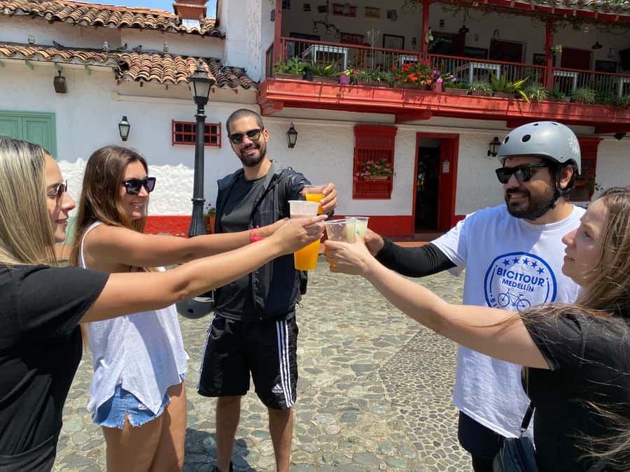 E-Bike City Tour Medellin with Local beer and Snacks - Food, beer, and the local pause