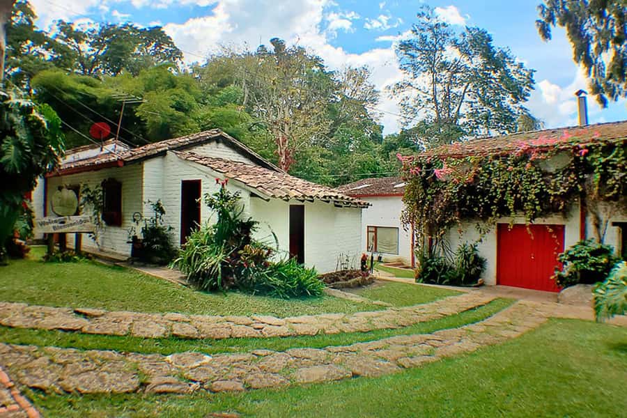 From Bogotá: Coffee Farm Experience Private Day Tour - Lunch in a colonial house, with one important question