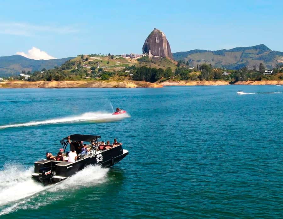 From Guatape: Pablo Escobar Mansion, Paintball & Boat Ride - Meeting in Guatapé’s central park