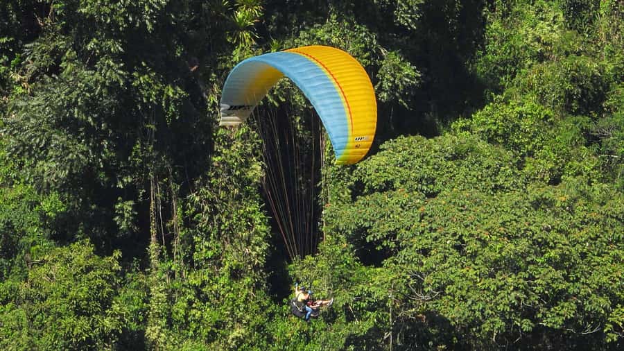 From Guatape:Paragliding and River Tubing private experience - Paragliding above Guacaica Canyon