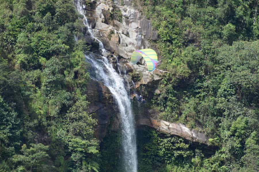 From Medellín: Paragliding and Rafting Combo Tour - Lunch between the two adventures