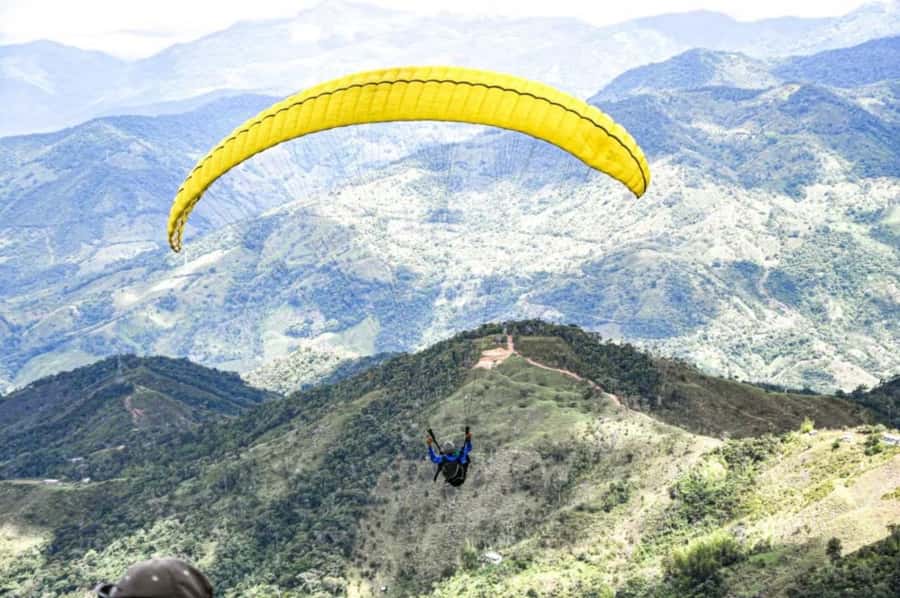 Guatape: Paragliding Experience - Safety briefing, helmet, and harness