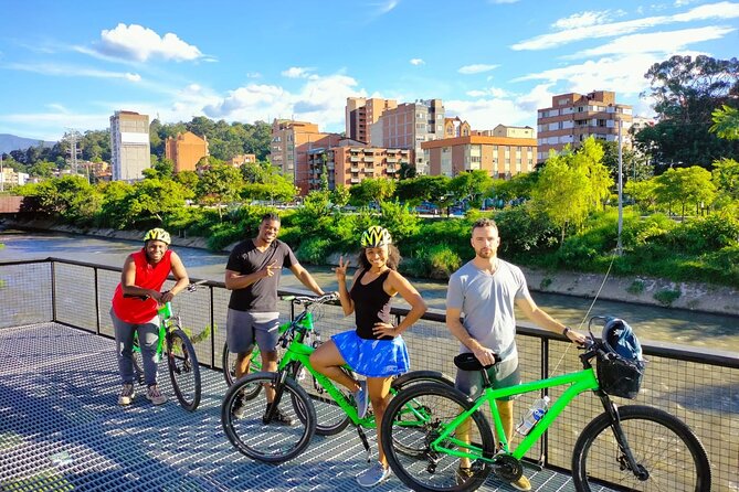 Half Day Bike Tour in Medellin - Local snack, Coffee or Beer - Parques del Río and the river that divides the valley