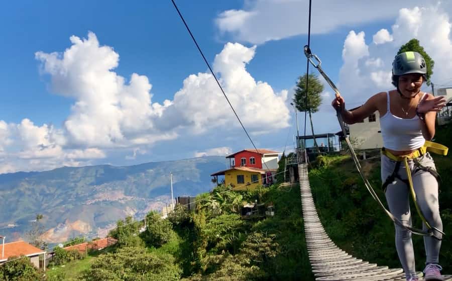 Medellin: Day Trip to Private Zipline and Waterfall Trek - Climbing the 70-meter rock wall