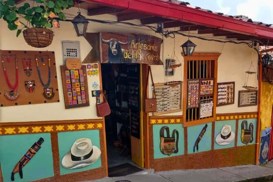Medellin: Guatape and El Penol Rock Day Trip with Boat Ride - Guatapé’s zócalos and painted streets