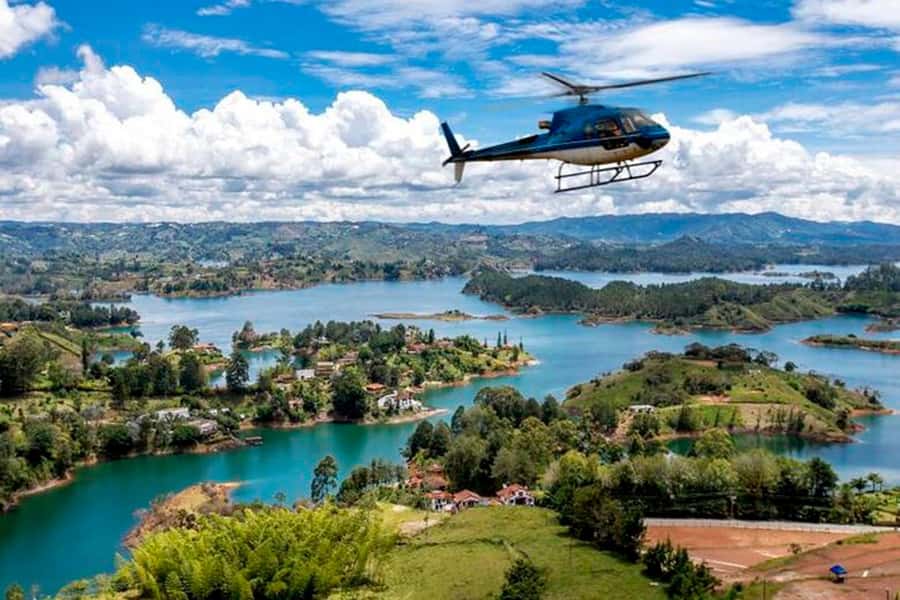 Medellín: Guatapé Private Tour with Helicopter & Boat Ride - Climbing La Piedra, one stair at a time