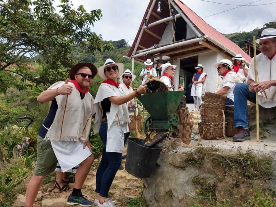 Medellín: Guatape Village with Coffee and Fruit Tasting Tour - El Peñol and the town beneath the reservoir