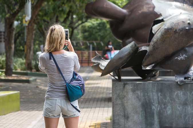 Medellin Historic Walking Tour with Expert Guide - Palacio Nacional, coffee, and local art