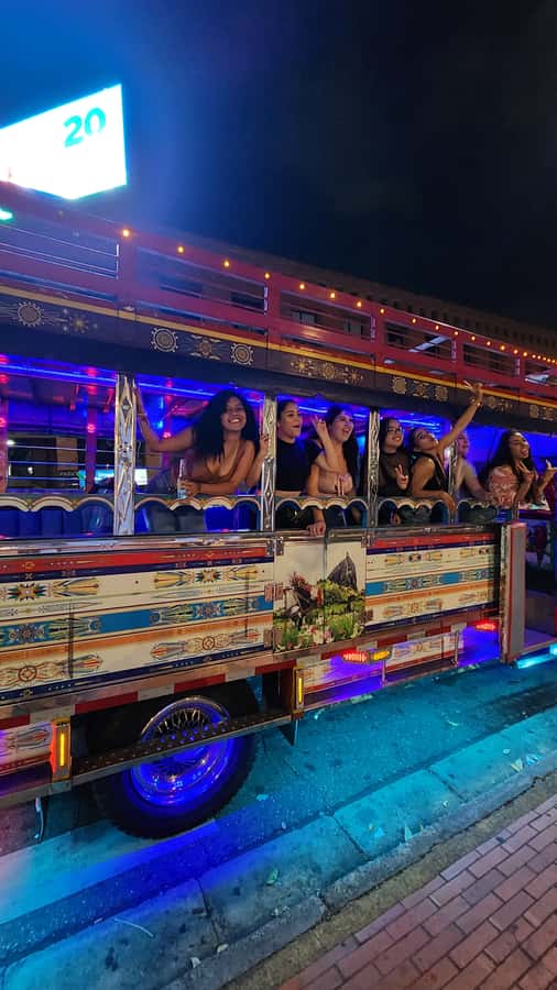 Medellin: Party Bus with DJ & Street Food Tastings - The Gilberto Echeverri Mejía Bridge photo stop