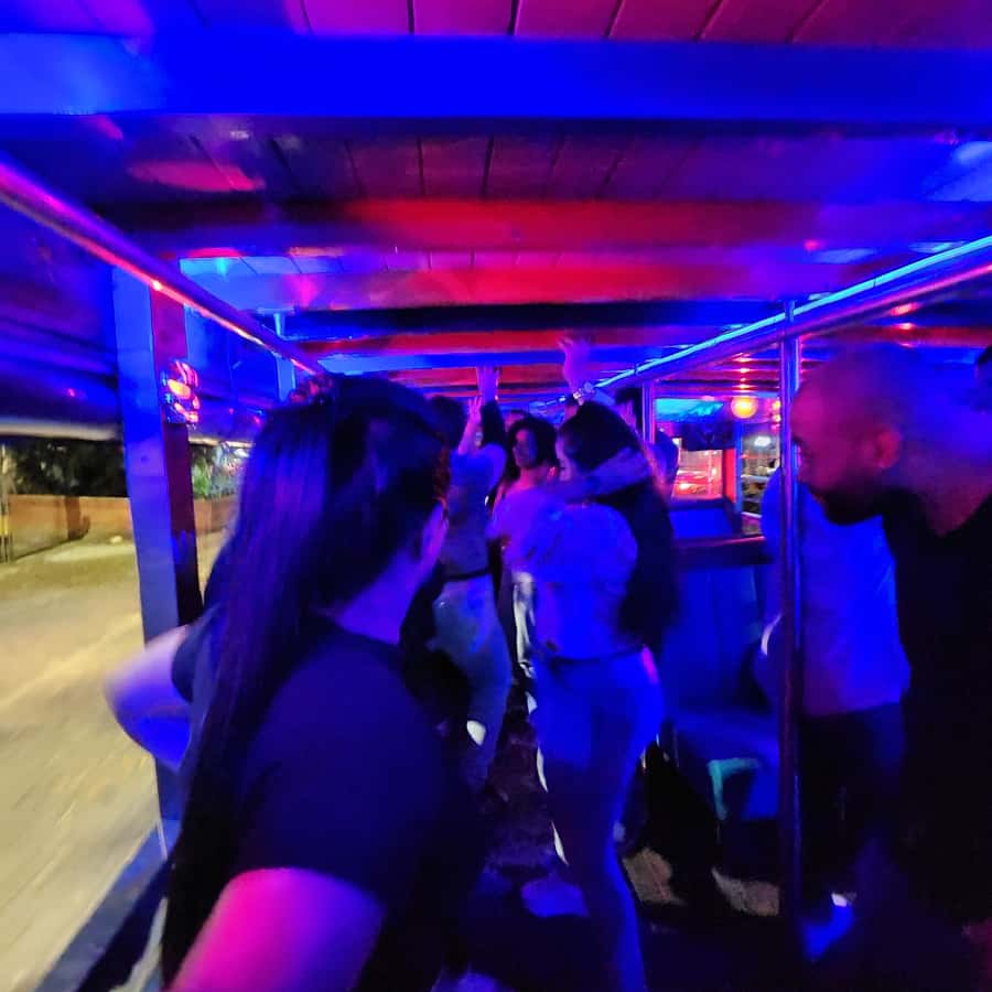 Medellin: Party Bus with DJ & Street Food Tastings - The people and party energy matter most