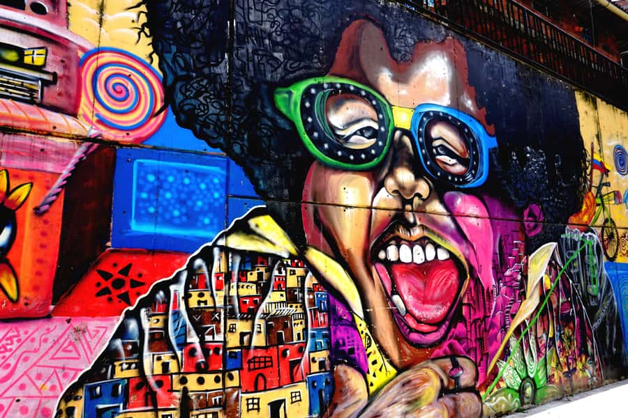 Medellín: Private Comuna 13 Street Art Tour - Poblado graffiti gives you a sharper eye