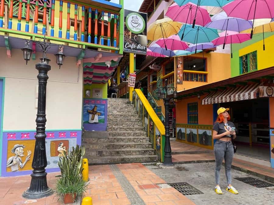 Medellín: Private Tour to Guatapé + Paragliding - Walking through colorful Guatapé