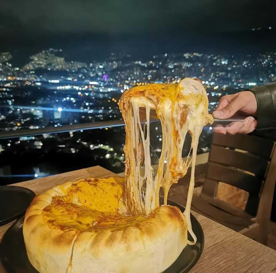 Medellin: tasting Street Food with Rooftops of El Poblado - The guides are a major part of the experience