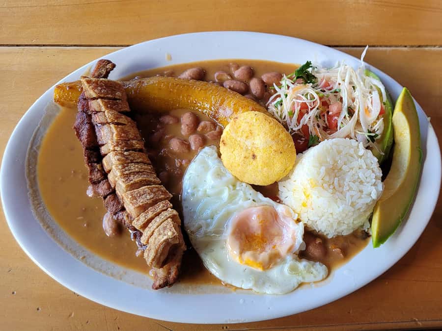 Motorcycle tour from Medellin to Guatape - Walking through Guatape’s painted streets