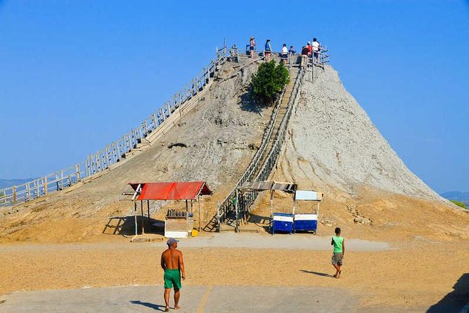 Mud Volcano and Pink Sea with Lunch Included - Rinsing off at the river