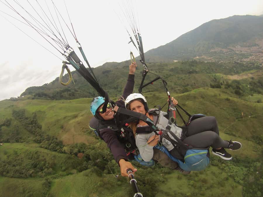 Paragliding Trip with Certified Pilots + Transportation - Takeoff above Medellín and the mountain valleys