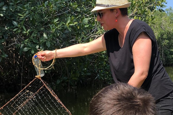 Private Fishing Adventure in the Mangroves - Fishing for bait with a handmade net