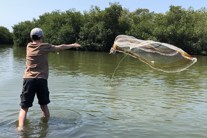 Private Fishing Adventure in the Mangroves - Setting the handmade crab traps