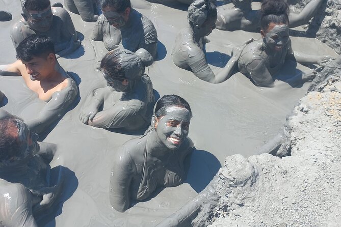 Private Mud Volcano Experience - Washing off after the mud bath
