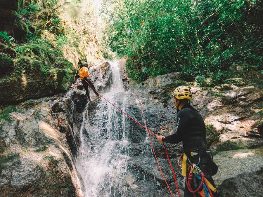 Rappel tour from Medellin. Transport by car or motorcycle - Rappelling three waterfalls, including the 25-meter drop