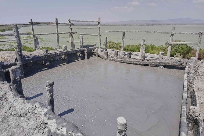Shared Cartagena Mud Volcano + Mangrove Tour including lunch - Washing off in the Caribbean
