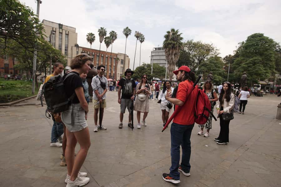 Shared Medellín Downtown Tour with Wireless Audio - Crossing Junín Street and the city’s passages