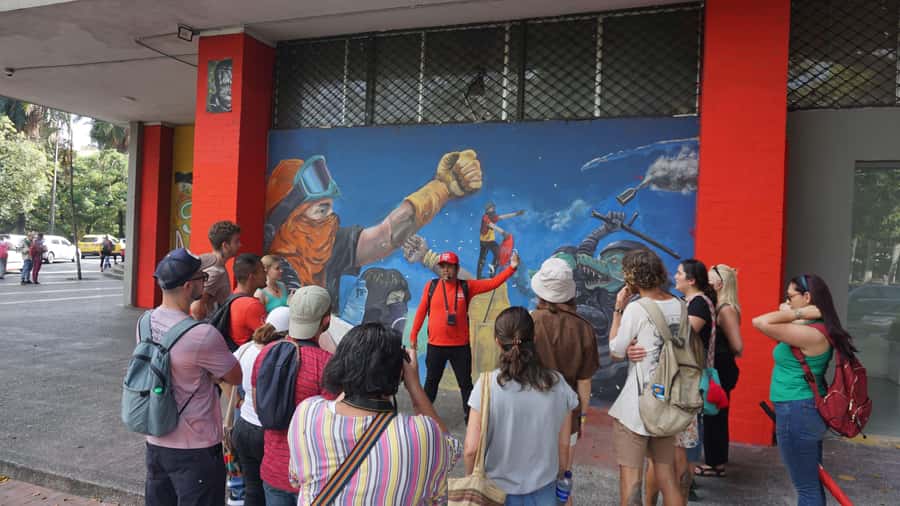 Shared Tour Cali's Salsa, Graffiti & Resistance Experience - Murals, victims, and messages of resistance