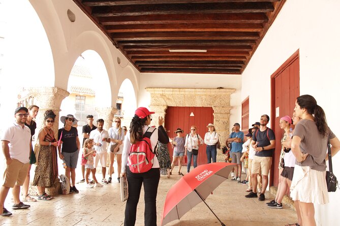 Walled Cartagena: Group Tour with Live Audio System - Colonial architecture along the old streets